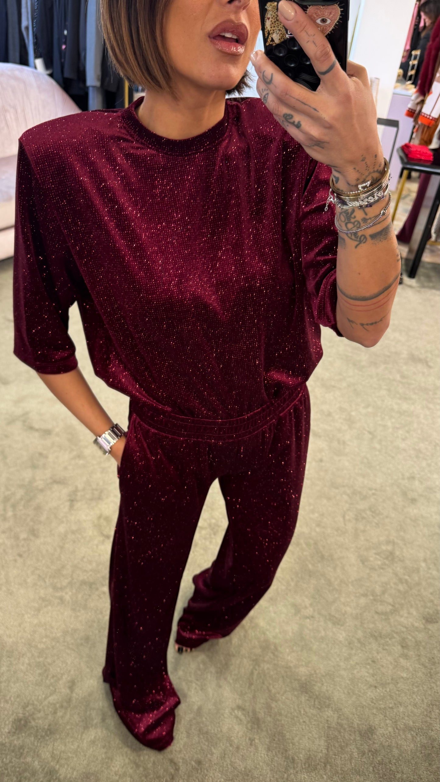 Pantaloni bordeaux glitter in ciniglia a palazzo