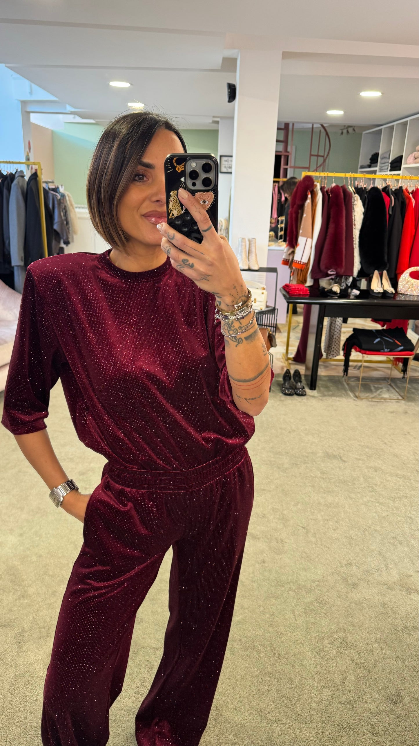 Pantaloni bordeaux glitter in ciniglia a palazzo